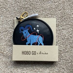 HOBO International Aries circular leather zipper pouch